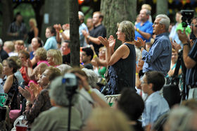 The crowd cheers a dance performance during the event. --Steve Gengler / Intelligencer Record Staff Photo.